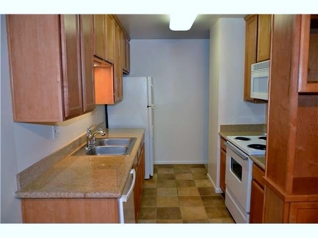 Property Photo:  1740 S El Camino Real J104  CA 92024 