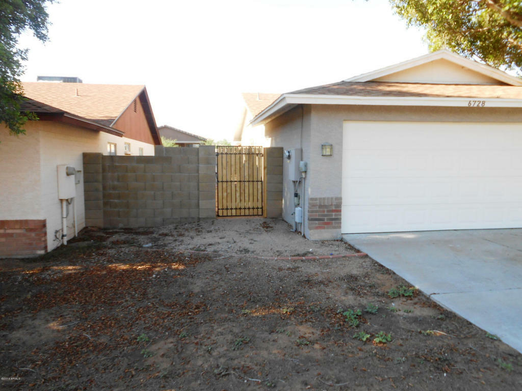 Property Photo:  6728 E Ensenada Street  AZ 85205 