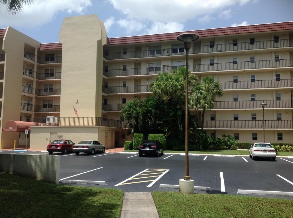 Property Photo:  3951 Via Poinciana 210  FL 33467 