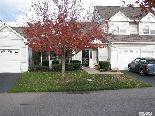 Property Photo: 1203 Pebble Beach Path NY 11901