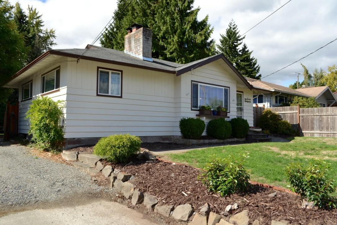 Property Photo:  10735 63rd Ave S  WA 98178 