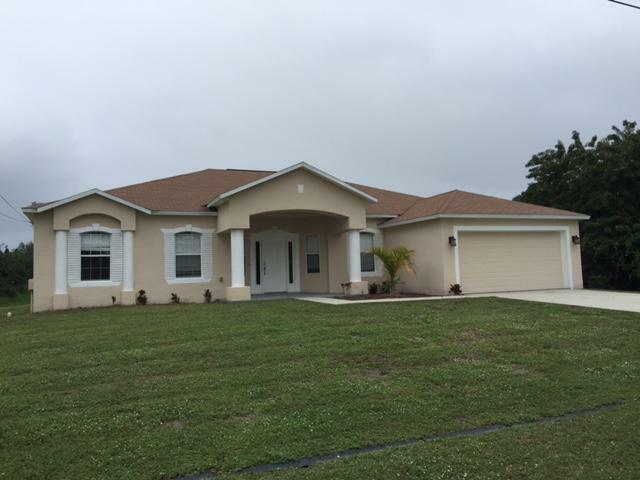 Property Photo:  1399 SW Bougainvillea Avenue  FL 34953 