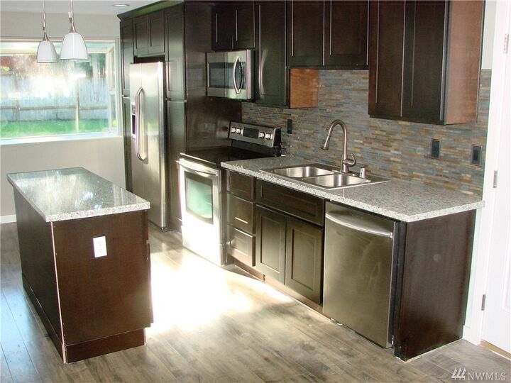 Property Photo:  3027 Forest Rim Ct S  WA 98374