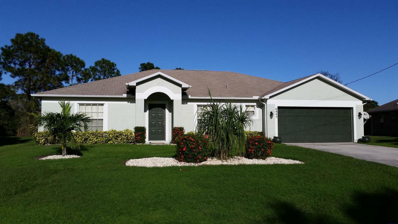 Property Photo:  6443 NW Regal Circle  FL 34983 