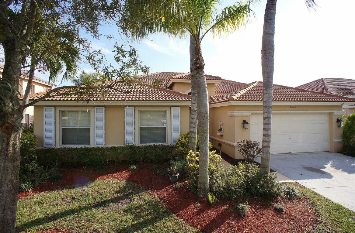 Property Photo:  6078 Las Colinas Circle  FL 33463 