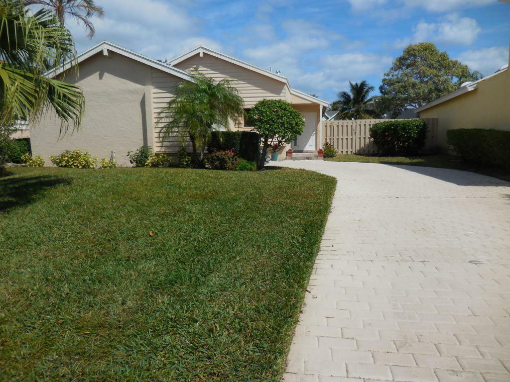 Property Photo:  1155 NW 20th Avenue  FL 33445 