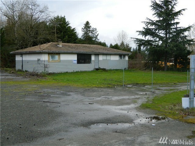 Property Photo:  128 E Marginal Wy S  WA 98168 