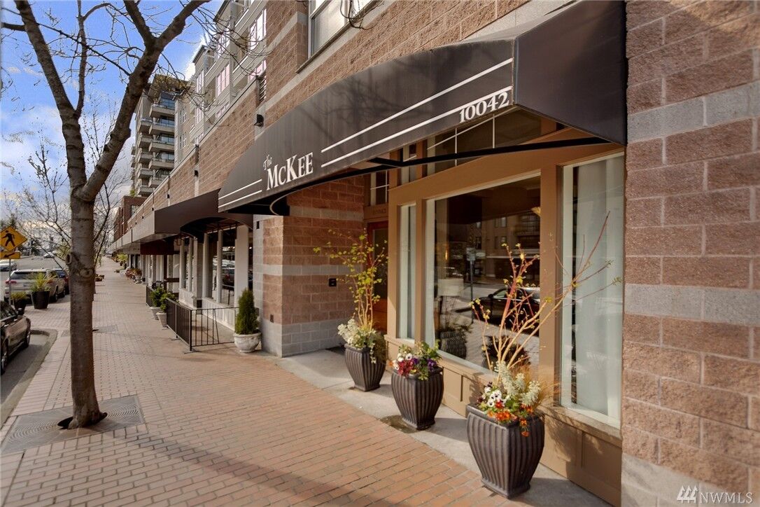 Property Photo:  10042  Main Street 403  WA 98004 