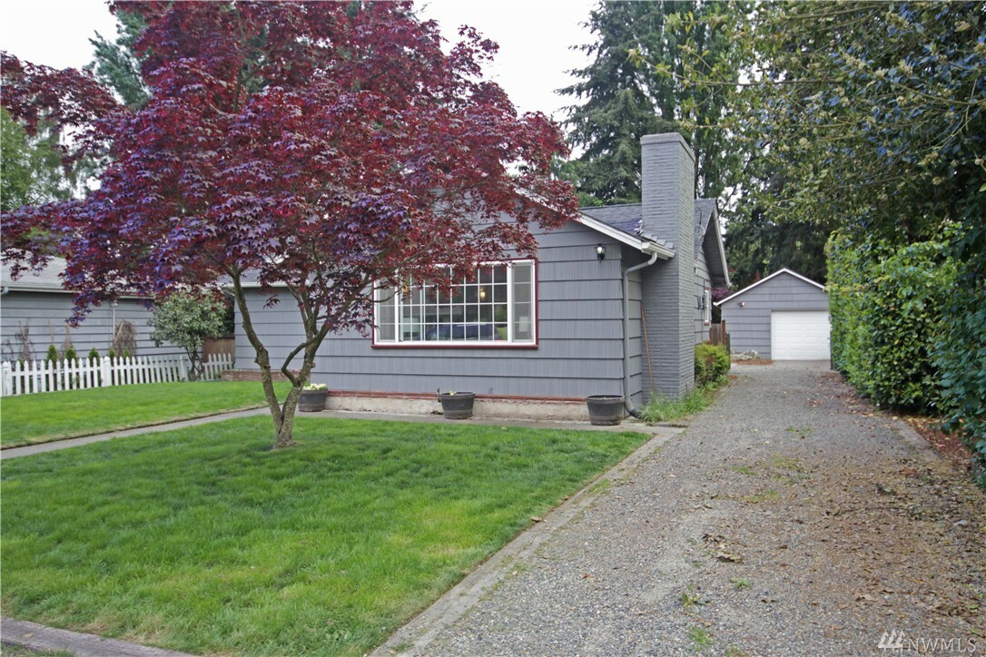 Property Photo:  1215 S 130th Place  WA 98168 