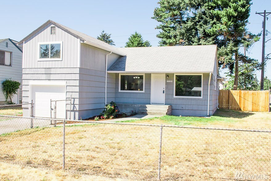 Property Photo:  6602 S Wapato St  WA 98409 