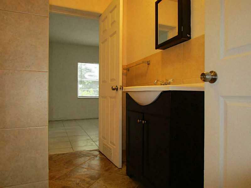 Property Photo:  225 NE 171 Te  FL 33162 
