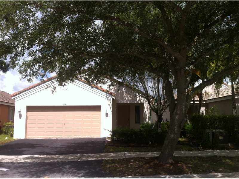 Property Photo:  1141 Areca Wy  FL 33327 