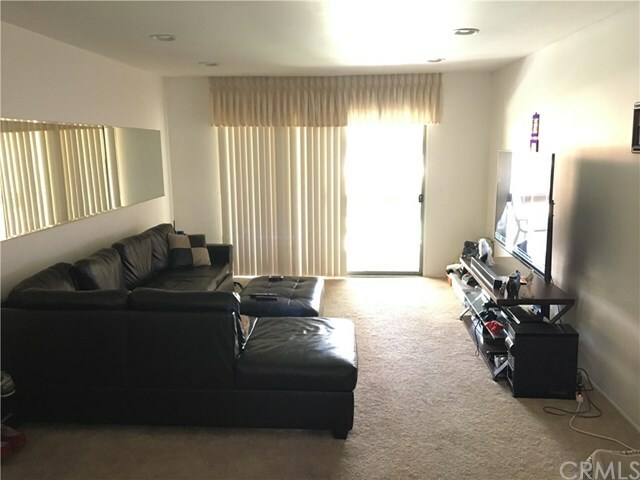 Property Photo:  6600 Warner Avenue 74  CA 92647 