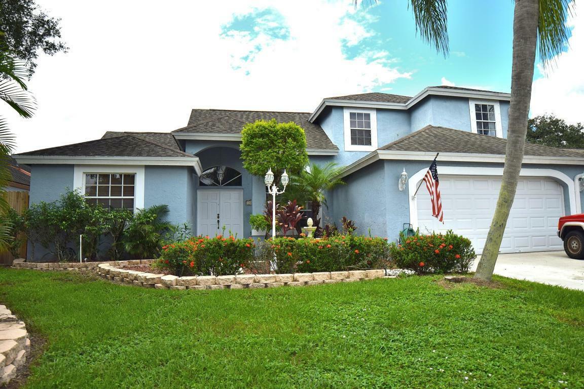 Property Photo:  13004 Meadowbreeze Drive  FL 33414 