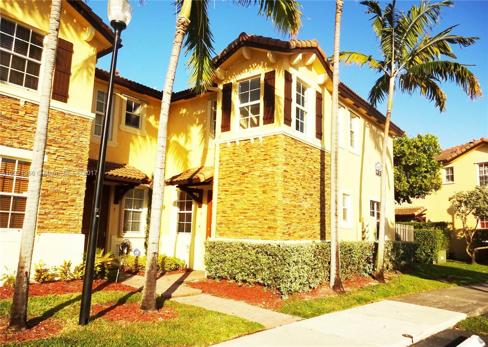 Property Photo:  9229 SW 227th St 6-9  FL 33190 