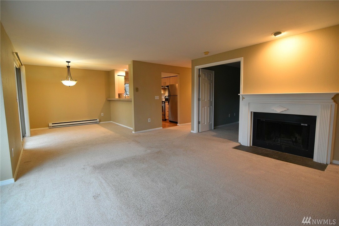 Property Photo:  208 Mt Park Blvd SW E-204  WA 98027 