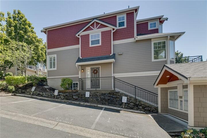 Property Photo:  2840 139th Ave SE 18  WA 98005 