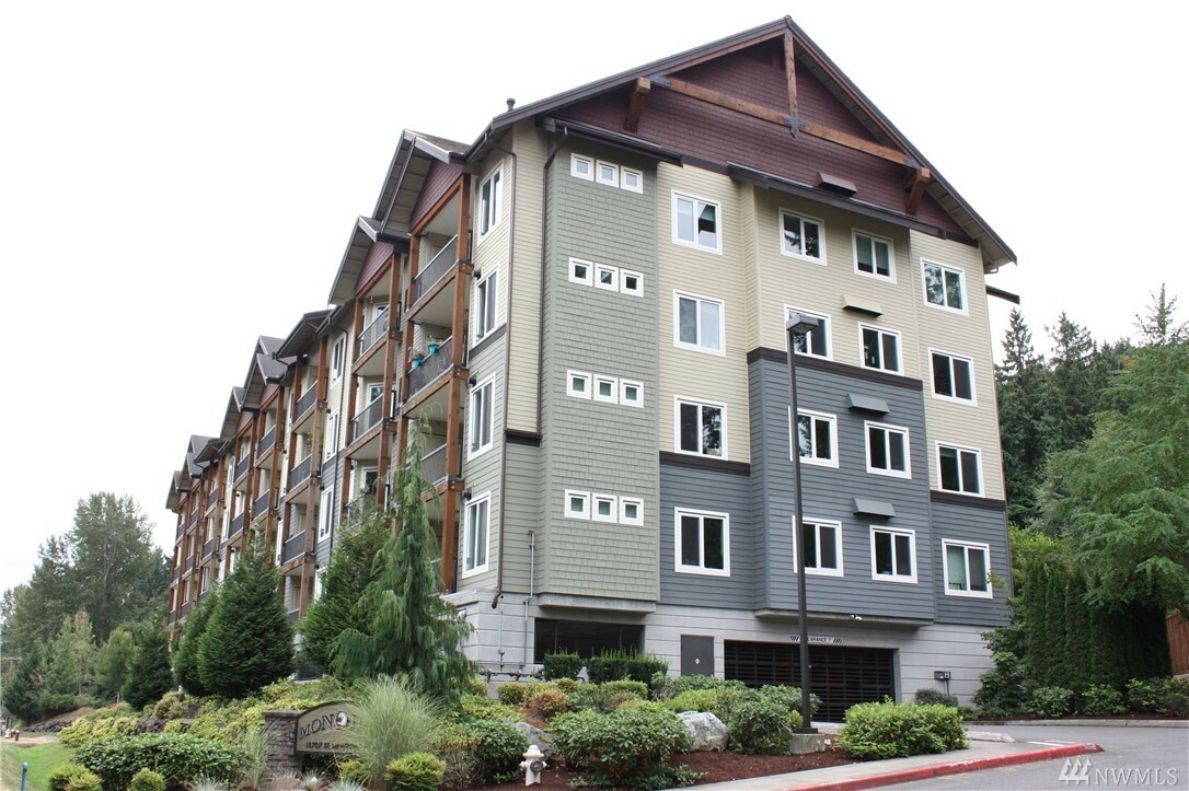 Property Photo:  18707 SE Newport Way 105  WA 98027 