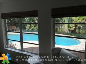 Property Photo: 1520 NE 40th Ct FL 33334