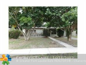 Property Photo:  822 SW 26th Ct  FL 33315 