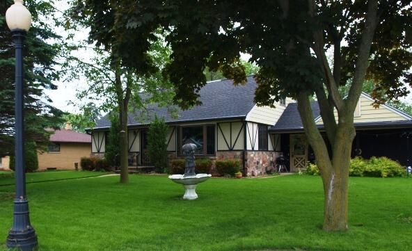 Property Photo:  202 Crestwood Dr  WI 53085 