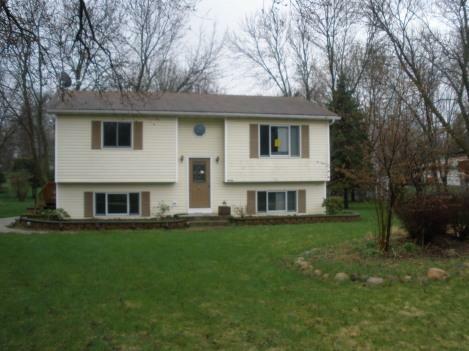 Property Photo:  W148 Tulip Dr  WI 53128 