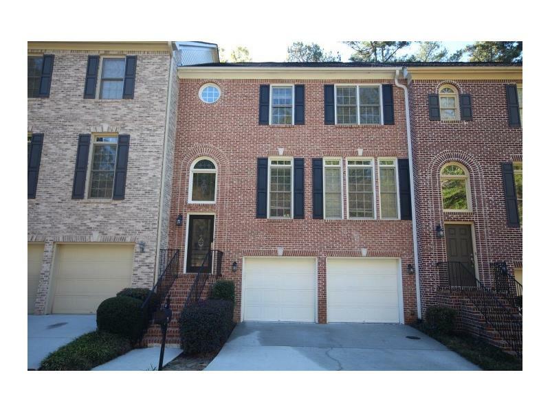 Property Photo: 7261 Village Creek Trace 30328