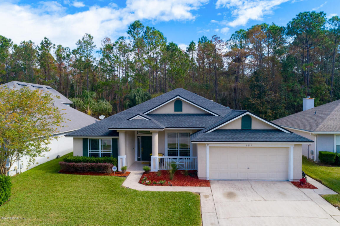 Property Photo:  8819 Canopy Oaks Drive  FL 32256 