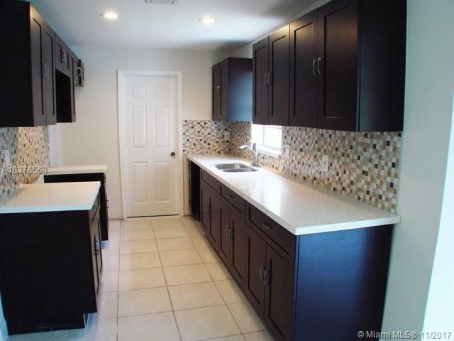 Property Photo:  4860 NW 9th Ter  FL 33309 