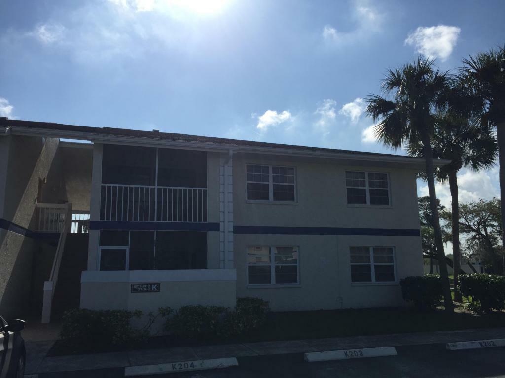 Property Photo:  1520 SE Royal Green Circle 201  FL 34952 