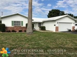 Property Photo:  4721 NW 11th Ave  FL 33309 