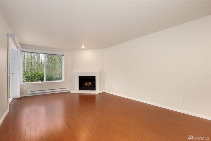 Property Photo:  11309 NE 128th St F103  WA 98034 