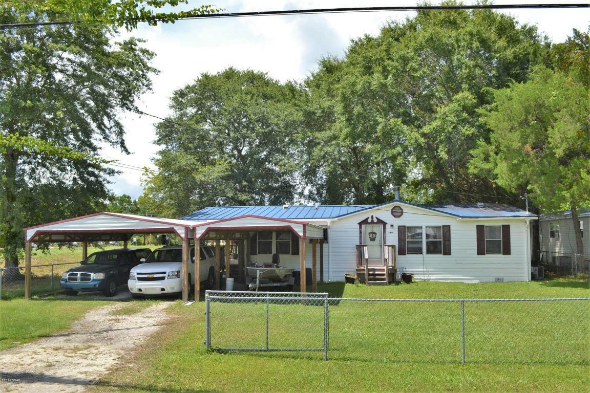 Property Photo: 7415 Walker Drive FL 32404