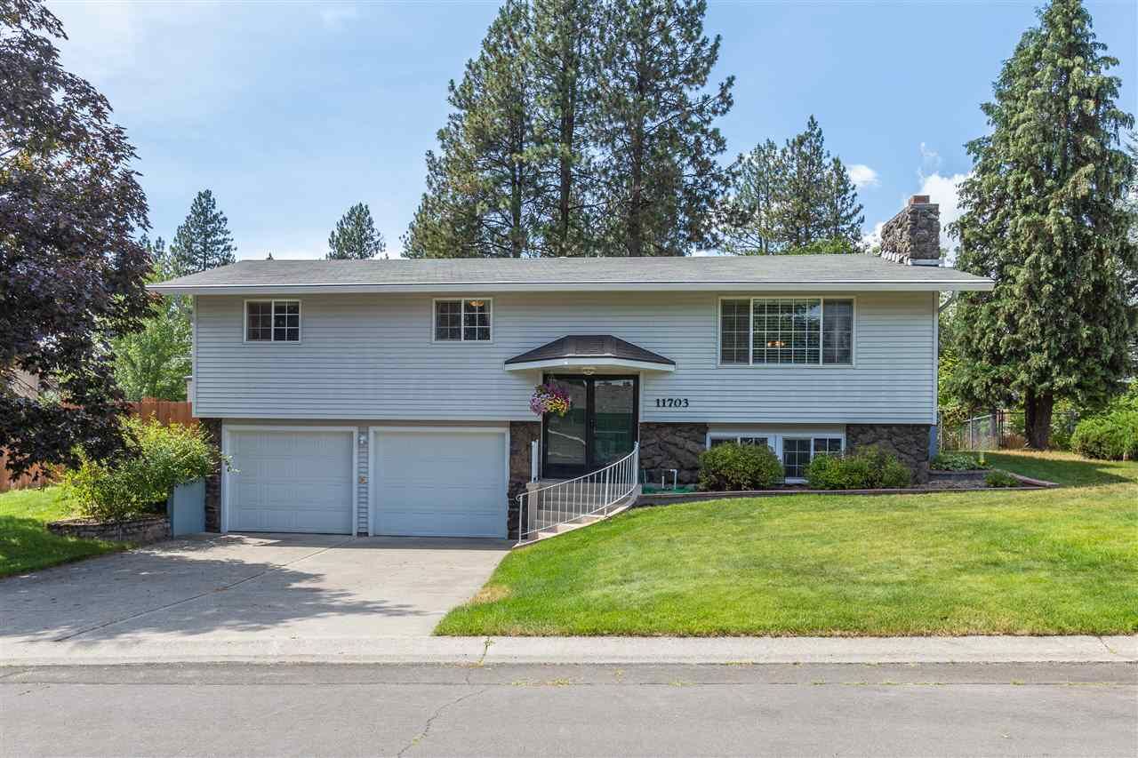 Property Photo:  11703 N Madison St  WA 99218 
