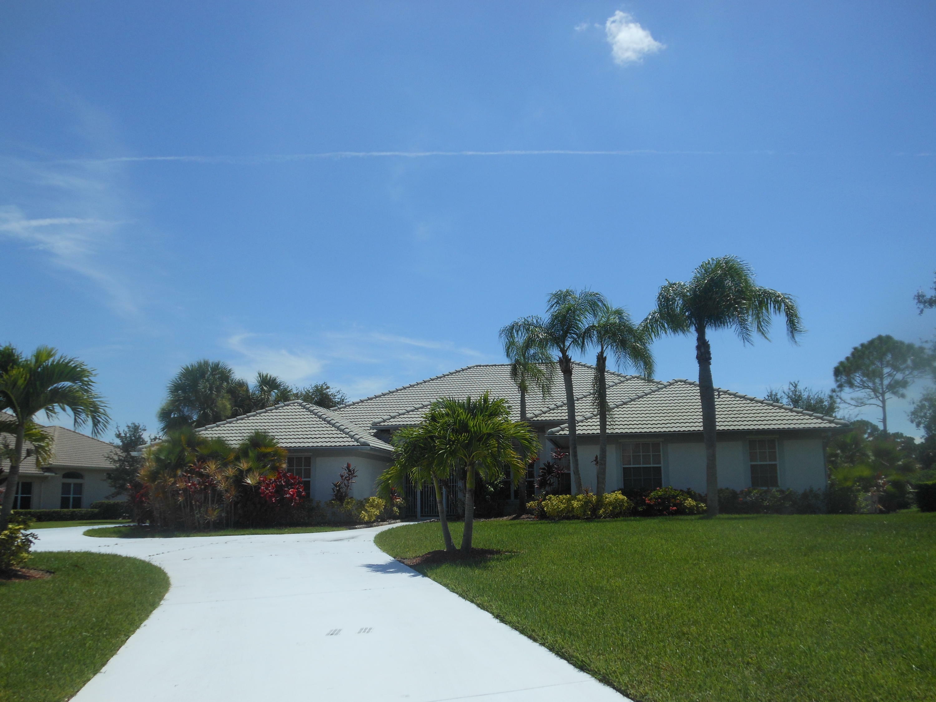 Property Photo:  8028 Plantation Lakes Drive  FL 34986 