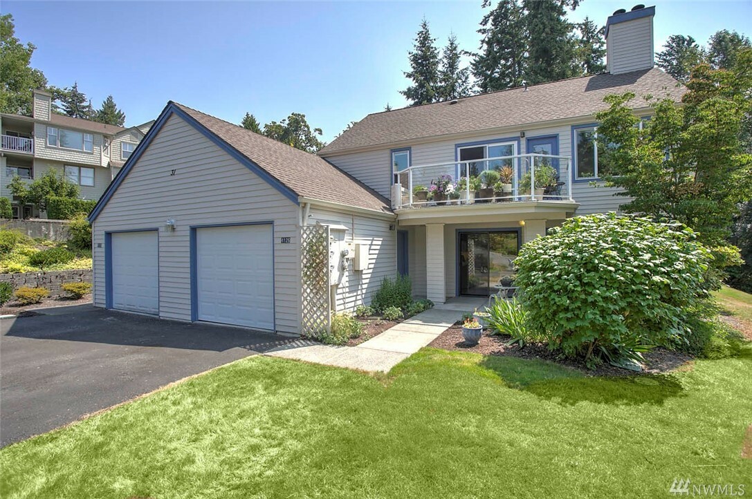 Property Photo:  4126 220th Place SE 1078  WA 98029 