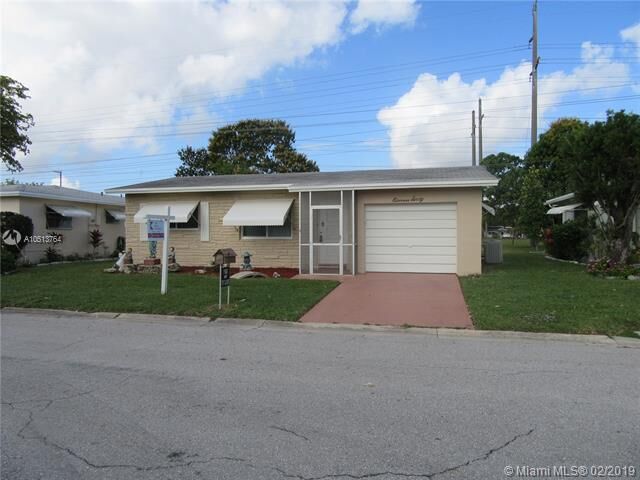 Property Photo:  1160 NW 70th Ln  FL 33063 