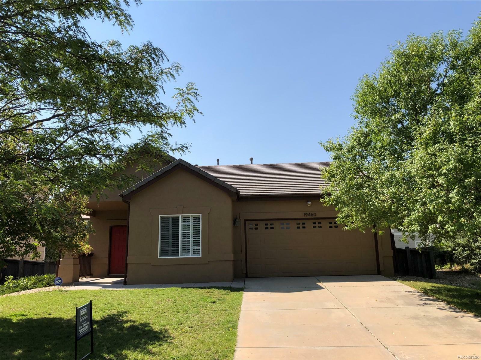 Property Photo: 19460 East 58th Drive CO 80019