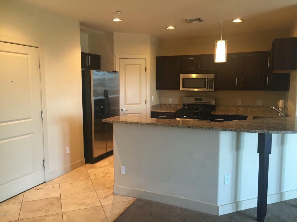 Property Photo:  945 E Playa Del Norte Drive 1020  AZ 85288 