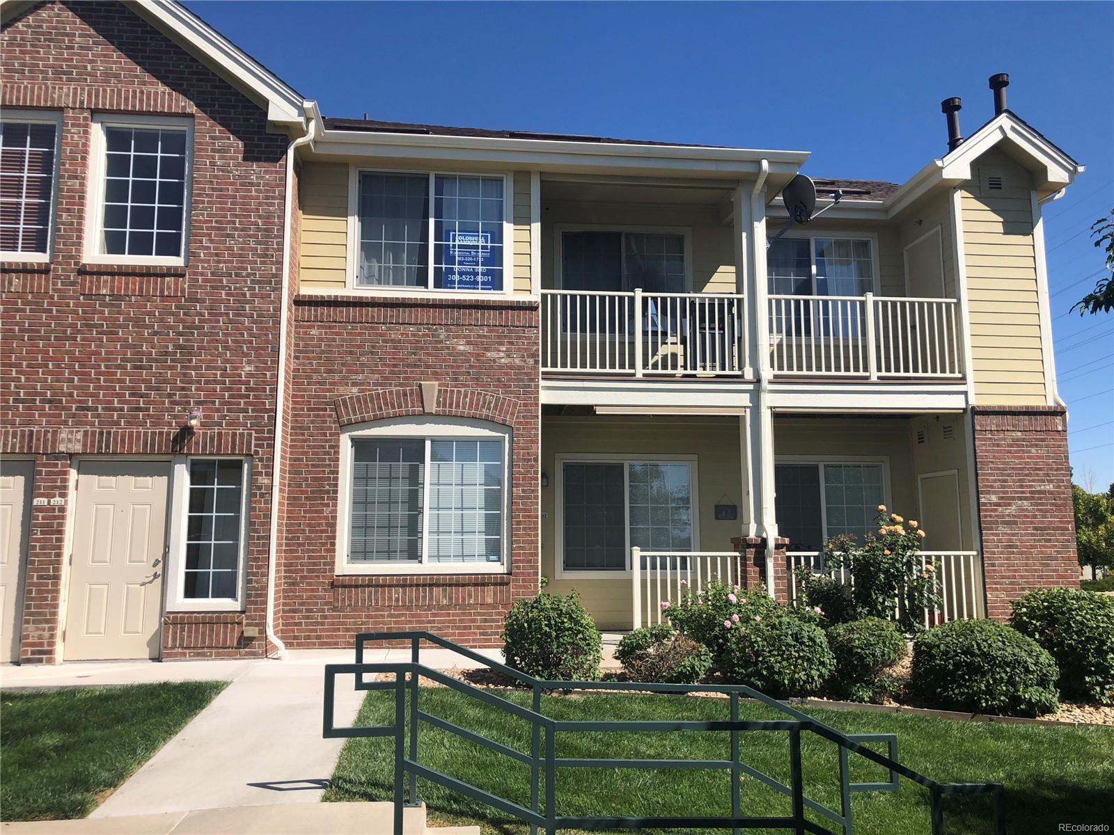Property Photo:  19303 East College Drive Unit 212  CO 80013 