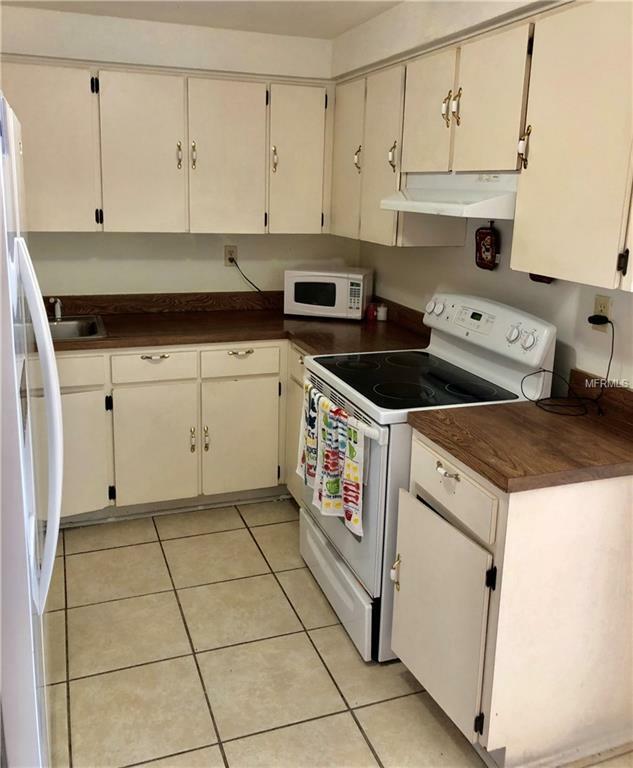 Property Photo:  6019 W Hanna Avenue  FL 33634 