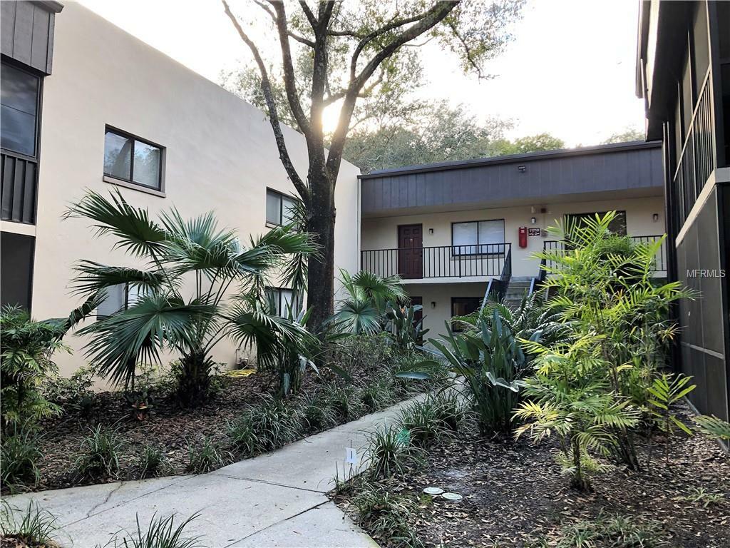 Property Photo:  11710 Raintree Village Boulevard A  FL 33617 