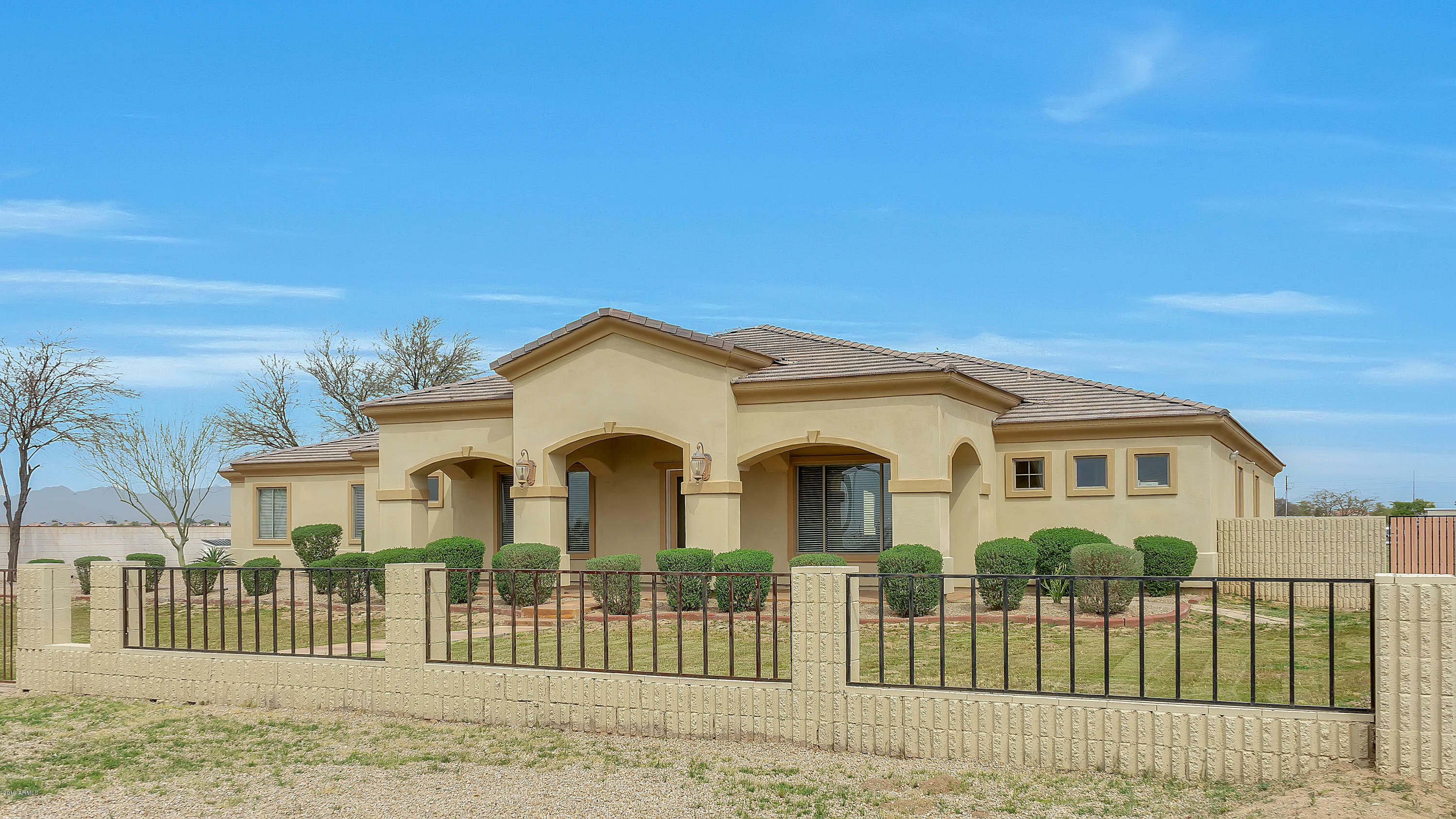 Property Photo:  16836 W Pioneer Street  AZ 85338 