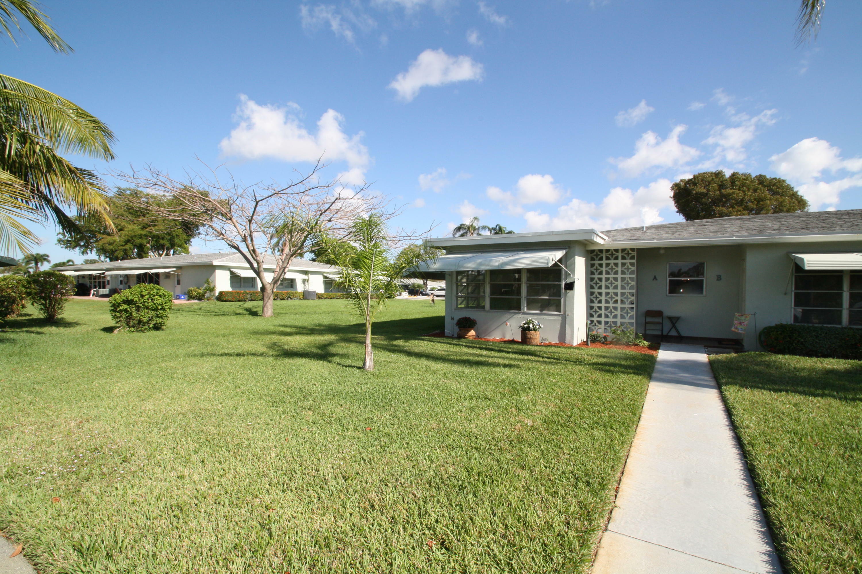 Property Photo:  617 High Point Drive A  FL 33445 