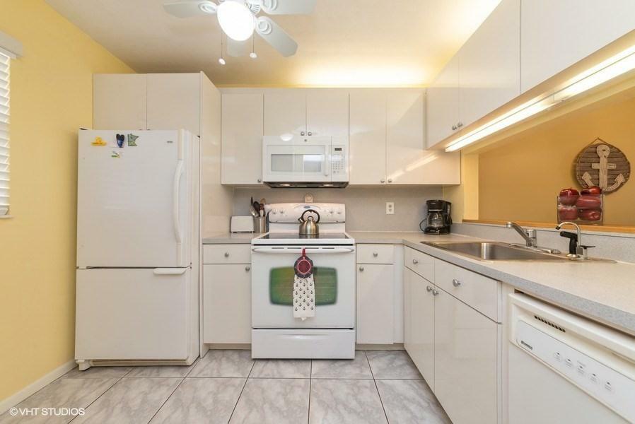 Property Photo: 7190 Golf Colony Court 104 FL 33467