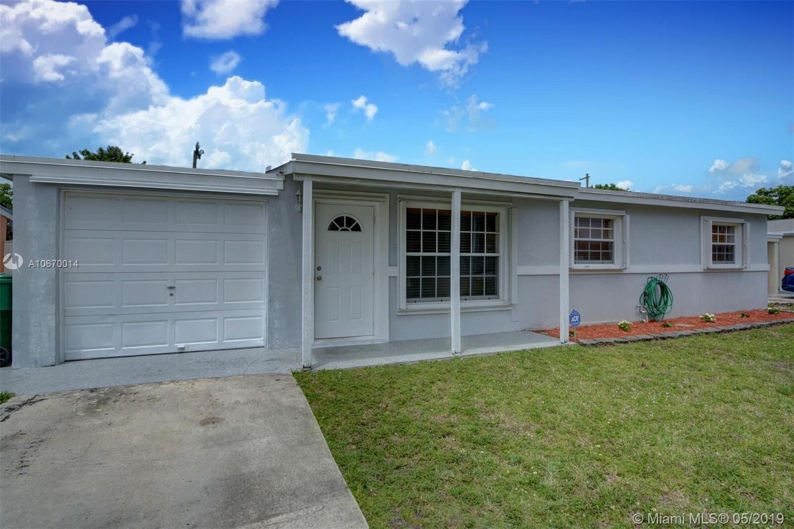 Property Photo: 6951 SW 26th Ct FL 33023