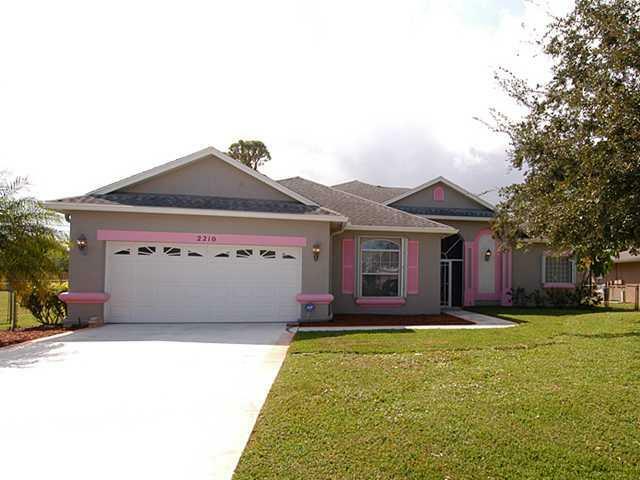 Property Photo:  2210 SE Genoa Street  FL 34952 