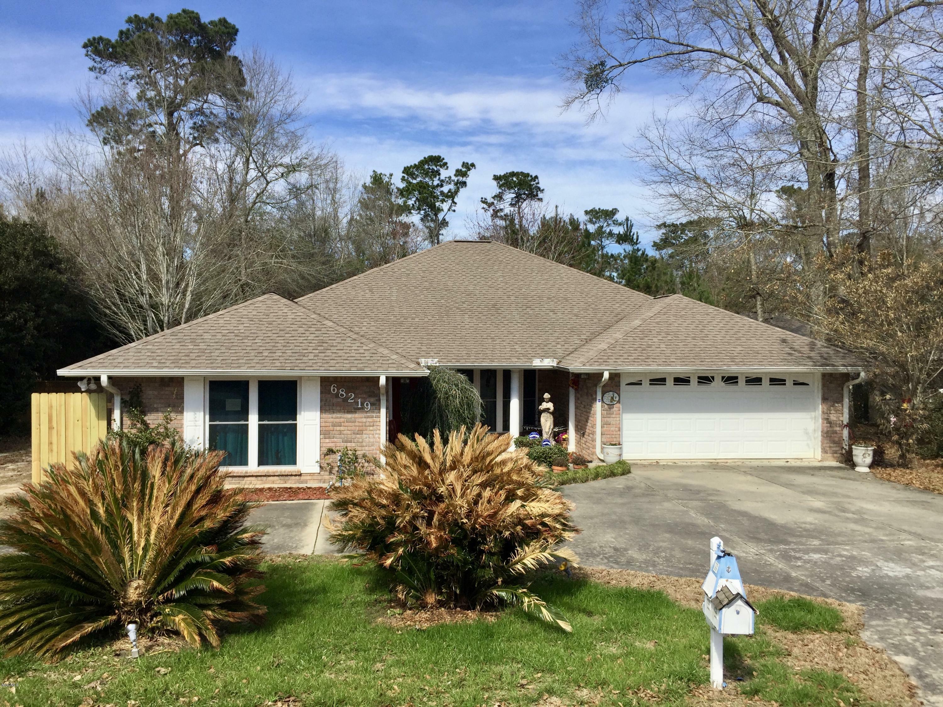 Property Photo: 68219 Diamondhead Drive East MS 39525