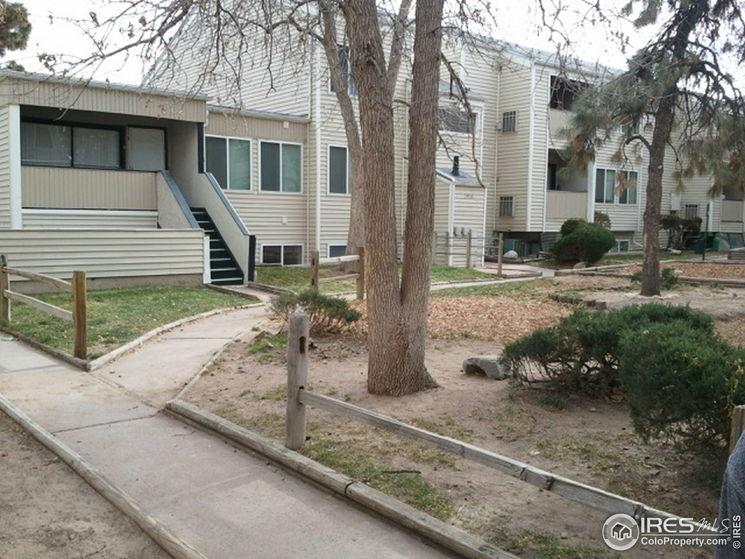 Property Photo:  10702 E Exposition Ave 104  CO 80012 