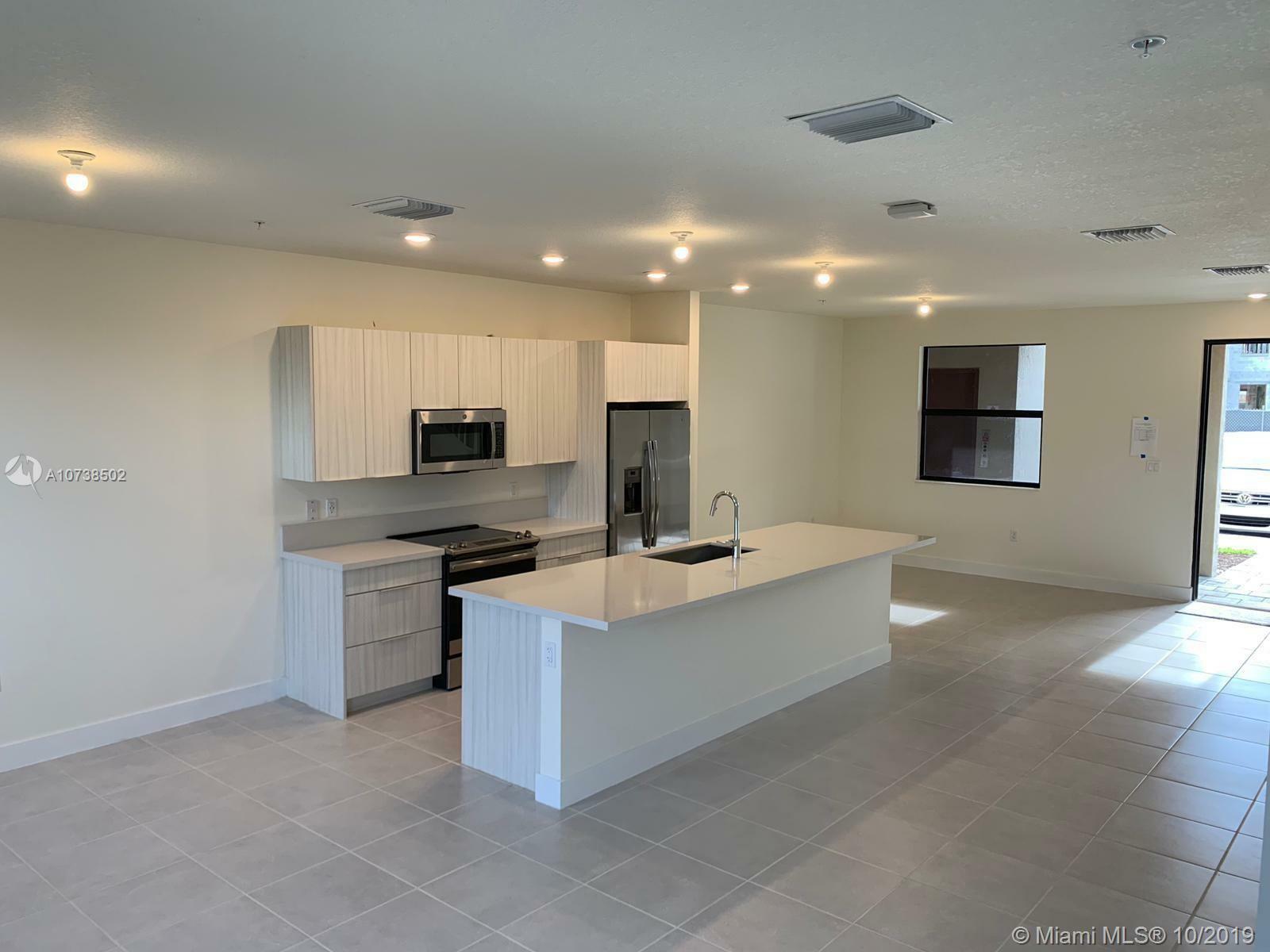 Property Photo:  10413 NW 82nd St 4  FL 33178 